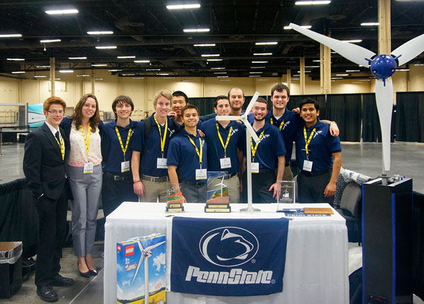 Group of Penn State students posing with awards.